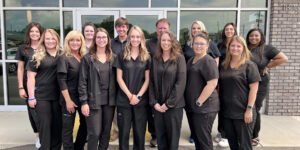 Dr. Steele's practice team. He says that investing in your team in salary, development opportunity, and by creating a positive office culture, pays off significantly for patients and practice profitability. 