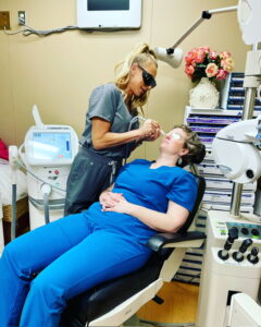 Dr. Hofacre administering an IPL treatment to a patient. Dr. Hofacre found that the large retail store where her practice is based has ideal shopper demographics for a dry eye center.