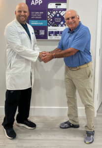 Dr. Snyder shaking hands with Ryan Beck, the medical director of the Dry Eye Rescue Clinic. Dr. Snyder says independent practitioners like Dr. Beck have to be conscious of limiting the expense of refunds while also being sensitive to patients' needs and feelings.